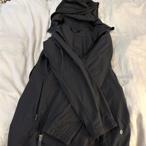 Woman’s Black Hooded Rain Jacket